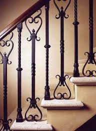 Custom Iron Balusters With Stained Wooden Hand Rail Travertine Treads Plaster Risers Walls Carr Iron Stair Railing Rod Iron Railing Wrought Iron Stair Railing