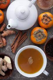 Spiced Persimmon Turmeric Tea Recipe Turmeric Tea Recipe Turmeric Tea Tea Recipes