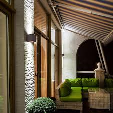 The charcoal finish allows the series to be utilized in a range of diverse facades. How To Light Your Outdoor Entryway Ylighting Ideas