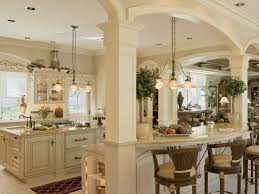 Colonial gold granite countertops described as bright yellow and black spots swirling over a rich creamy background basically. Colonial Kitchens Hgtv