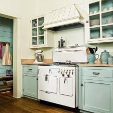 Decorate Your Kitchen With Two Tone Cabinets Repainting Kitchen Cabinets Cottage Kitchens Home Kitchens