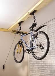 A bicycle parking rack, usually shortened to bike rack and also called a bicycle stand, is a device to which bicycles can be securely attached for parking purposes. Bike Storage Ceiling Pulley Off 76 Felasa Eu