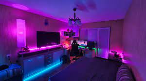 In this awesome game room, color changing rgb led lights have been placed around the entire cove of the basement ceiling for incredible lighting. Gaming Setup Bed Room
