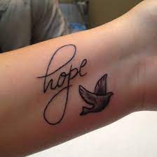 Check spelling or type a new query. Hope Grey Ink Flying Dove Tattoo On Wrist