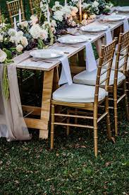 Gold Tiffany Chairs White Timber Trestle South Coast Weddings South Coast Party Hire Curly Willow Photog Tiffany Chair Table Setting Decor Chair Decorations