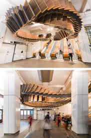 80 Year Old Wooden Escalators Repurposed As Interlooping Ceiling Sculptures Artistic Installation Installation Design Architecture