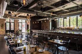 Located In The West Town Neighborhood Of Chicago This 4 000 Square Foot Space Was Once Bedroom Industrial Chic Bar Interior Design Industrial Chic Living Room