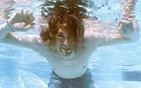 The cover of nirvana's 1991 album nevermind. however, robert y. See The Rare 1991 Shots Of Nirvana Recreating Nevermind S Cover In A Pool