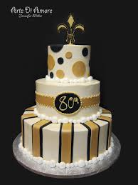 Four layer black & white cake. Gold And Black Birthday Cake
