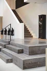 Zigzag A Concrete Split Level House With A Carefully Detailed Wooden Staircase Concrete Staircase Concrete Stairs Stair Railing Design