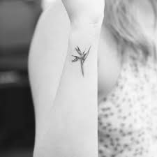 Bird Of Paradise Flower Tattoo On The Right Wrist By Evan Kim Paradise Tattoo Bird Of Paradise Tattoo Bird Tattoo Wrist