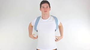 A newly designed back brace for improving posture. How To Wear The Posture Brace Backpainhelp Com Youtube