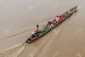 PANTOJA, PERU - JULY 14, 2015: Villagers On A Dugout Canoe Called.. Stock  Photo, Picture And Royalty Free Image. Image 63407799.