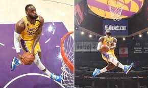 Home » basketball » lebron james dunk. Stunning Image Of Lebron James Throwing Down Reverse Windmill Jam Leaves Nba Fans Marveling Daily Mail Online