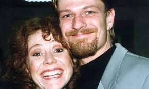 With second wife Melanie Hill. As a young man he was fined £50 for causing actual bodily harm. “It was at drama school,” he once explained. - 54504_2
