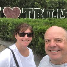 Where can my 19-year-old son spend Christmas while backpacking in Europe,  as Switzerland is too expensive?