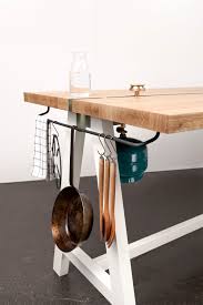 Create a lively dining room environment with this counter table. Concept The Cooking Table Studio Moritz Putzier