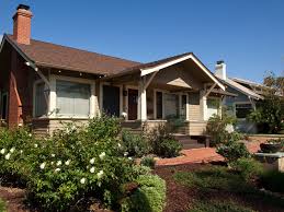 Originally, this home was painted darker colors, but the current color scheme of cream and ruddy brown has been used for at. American Bungalow Style Houses 1905 1930