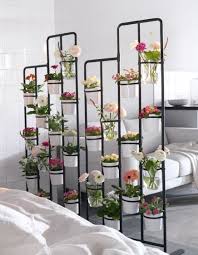 This Inexpensive Ikea Plant Stand Is Great For A Room Divider Inside Or Outside Ikea Plants Ikea Plant Stand Room With Plants