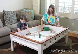 Picture Of Kid Friendly Coffee Table In 2020 Diy Kids Table Coffee Table With Hidden Storage Diy Toy Storage