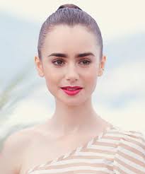 A french guy is going to give you a push in this direction: Lily Collins Is French Girl Beauty In Emily In Paris