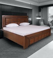 Ireland collection by acme furniture contemporary style cherry finish queen pu storage bed storage drawers on footboard and sides drawers and shelves. Buy Wendy King Size Bed With Storage In Light Walnut Finish By Trendsbee Online Contemporary King Size Beds Beds Furniture Pepperfry Product