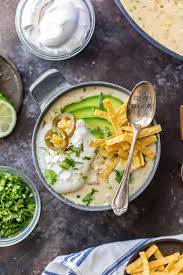 Chicken thighs, dried navy beans (soaked overnight), chicken broth, onion, spicy green chiles, white chicken chili seasoning mix, cumin, garlic, and salt. Creamy White Chicken Chili With Cream Cheese How To Video