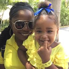 Rosheena from Glenford Phipps Basic School all smiles with CSR Committee  Member, Patrice Howell, at JEP/WKPP's Children's Treat happening now at  Hope Zoo. #JEP #WKPP #NationalChildrensDay #PoweringABrighterFuture