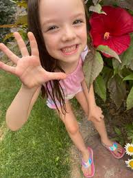 And the front yard hibiscus are blooming now!