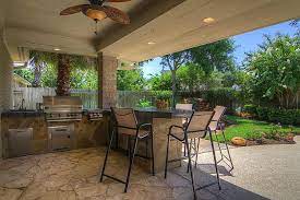 Patio With Recessed Lights And Ceiling Fan Gas Grill Outdoor Kitchen Wine Cooler Surround Sound Sink And Even A I Ph Patio Backyard Outdoor Furniture Sets