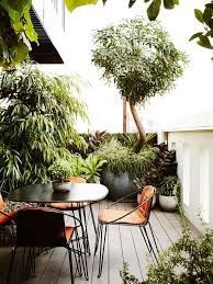 Eight Modern Urban Jungle Patios That Are Perfect For Lounging Idle Hands Awake Pergola Shade Diy Rooftop Garden Garden Patio Furniture