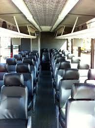The Inside Of The Black 29 Passenger Coach Equipped With Leather Seats Leather Seat Car Seats Leather