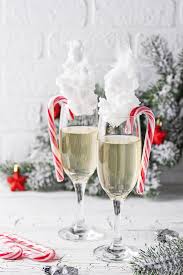 A traditional mimosa is made with about two cups of orange juice and a bottle of prosecco or champagne . Champagne Or Prosecco With Cotton Candy Stock Image Image Of Christmas Candy 160487803
