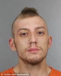 Dog mourns death of his master who was shot in Colorado