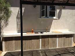 Outdoor kitchens we offer a large selection of hand crafted bbq islands, outdoor kitchens, and fire features designed to fit your space, budget, and lifestyle. Reclaimed Outdoor Kitchen Via Iandccraftsmanship Com Outdoor Kitchen Cabinets Wood Outdoor Kitchen Outdoor Kitchen Design