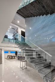 For those with newer homes and want to check out the latest designs, here is a picture gallery of 21 beautiful modern stair railing ideas. Modern Luxury Staircase With Glass Side Luxury Staircase Staircase Design Modern Modern Staircase
