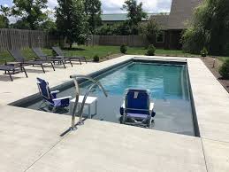 Enjoy Life At Its Best With The Imagine Pools Freedom With Splash Pad Fiberglass Swimming Pool L Fiberglass Swimming Pools Swimming Pools Fiberglass Pools