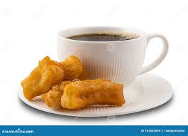 Bastón Para Pasta Frita Y Una Taza De Café Negro Caliente Imagen de archivo  - Imagen de delicioso, fondo: 192432609