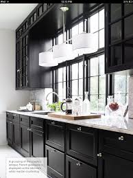Love The Black Cabinets With White Granite Counters Kitchen Trends Kitchen Design Kitchen Inspirations