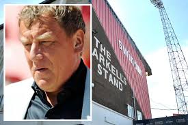 Why is Swindon Town ownership in doubt? Who is Michael Standing?