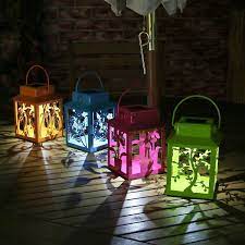 4 Coloured Solar Powered Metal Outdoor Lantern Lights Amazon Co Uk Kitchen Home Outdoor Solar Lights Solar Light Crafts Solar Lights Garden