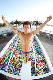 Tom daley's talents go far beyond the diving board. Tom Daley Dives Into Epic Ball Pool To Spread Important Message Plymouth Live