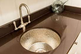 Close Up View Of The Espresso Caesarstone Quartz Countertop And The Beautiful Hammered Copper Sink In The Porcelain Countertops Countertops Quartz Countertops
