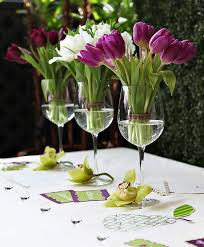 25 Beautiful Table Centerpieces That Are Perfect For Welcoming Spring Into Your Home Wine Glass Centerpieces Flower Arrangements Glass Centerpieces