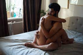 Naked Couple Hugging On Bed