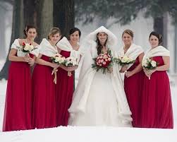 Philip And Sarah S Christmas Wedding The Knot Christmas Bridesmaid Dresses Christmas Wedding Dresses Christmas Bridesmaids