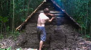 Building a fort in the woods with scrap material and logs. This Guy Shows You How To Build A Woodland Fortress And Make Nature Your Bitch Video