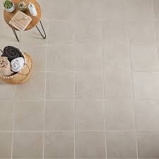 Which is the best tile to buy for outdoor flooring? Ideal Beige Matt Marble Effect Ceramic Wall Floor Tile Pack Of 13 L 338mm W 338mm Diy At B Q