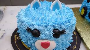 Ingredients · box (18.25 oz.) yellow cake mix · 16 ounce can + 1 cup vanilla frosting · blue and red food coloring · graham crackers · little debbie snow puffs Cat Kitten Birthday Cake Designs Idea S How To Make Beautiful Cat Cake Blue Kitten Cake Decorate Youtube