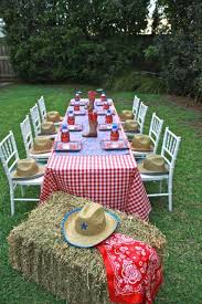 Table For A Cowboy Party Love The Hats On The Chairs Cowboy Party Cowboy Theme Party Cowboy Birthday Party Birthday Party Tables